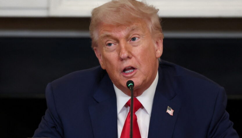 ‘looking-for-an-excuse’:-trump-under-fire-for-violent-slogan-as-he-sends-marines-to-la